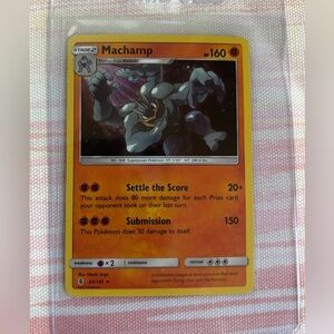 Pokémon TCG Machamp 65/145 Cosmos Holo rare card from the 2017 Guardians Rising